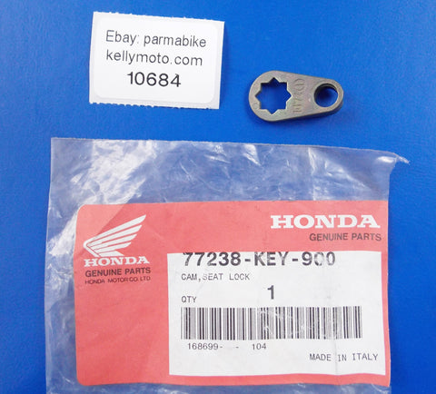 NOS OEM HONDA 1998-2002 FES125 2000-2006 NES150 SEAT LOCK CAM 77238-KEY-900 - MotoRaider